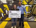 Pictured left: Grace Hartin, standing next to Joel Northcutt, smiles for the cameras after receiving a $1,000 Texoma Excellence in Fine Arts Scholarship. Courtesy photos