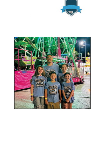 A family enjoys the National Sand Bass Festival, despite the rainy weather. Photo courtesy of Deborah Arterberry