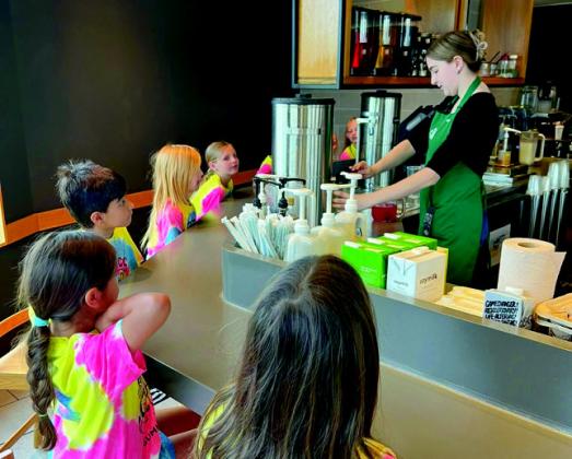 Madill day care visits businesses