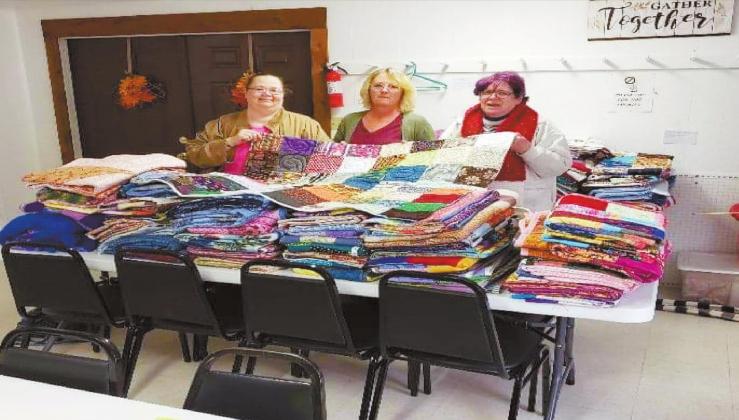 Pictured from L to R are Kim Gentry, Tammy Smith and Phyllis Cox who spent a tremendous amount of time cutting, tying, and sewing. Courtesy photo