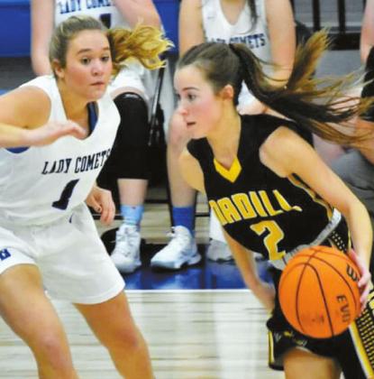 Taren Greathouse Jayden Weiberg runs the ball down the court during the Wildcats v. Comet game on December 19, 2020.