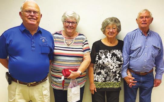 Tishomingo Order of the Eastern Star honored four members for their many years of membership. Paul and Betty Roan, Tishomingo, 32 years, and Dall and Wanda Peoples, Madill, 45 and 47 years. Courtesy photo