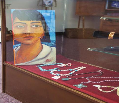 First American creations such as this painting by Dustin Mater and beadwork necklaces from various artists fill the cases at the Chickasaw Holiday Market, making it easy to find one-of-a-kind, handcrafted gifts with deeper meaning. Courtesy photo