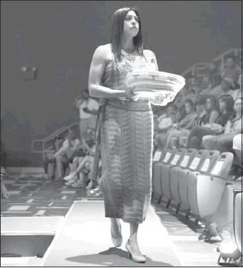 Courtesy Photo Alanah Reed modeling a design by Margaret Roach Wheeler of Mahota Textiles at the Native Creativity Fashion Show.