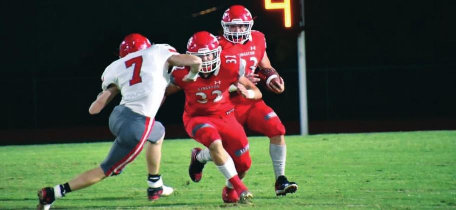 Grant Holmes blocks while Brandon Watson runs through with the ball. Kingston lost to the Sulphur Bulldogs 34-19, leaving the upcoming game against Pauls Valley as the tie breaker for Kignston. Linda Holmes