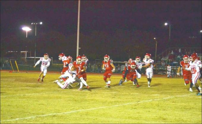 Lori Robinson • The Madill Record Kingston junior running back Boomer Morgan runs the ball in the Redskins’ Week 9 win over Comache. Up next, Kingston returns home as District Champions to host Community Christian on Friday, November 15.