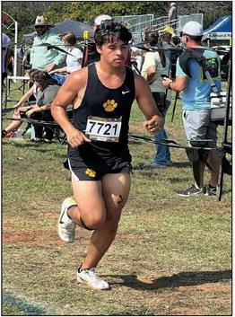 Yadira Barbosa, left, placed 4th and James Valdez, right, took 8th place in the cross country meet on September 22. Courtesy photos