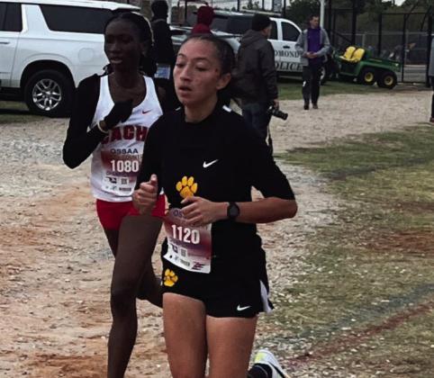 James Valadez, left, and Yadira Barbosa placed in the Sante Fe High School cross country meet. Courtesy photo
