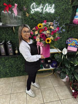Laura Mendez took her love of floral arrangements to open Sweet Petals.
