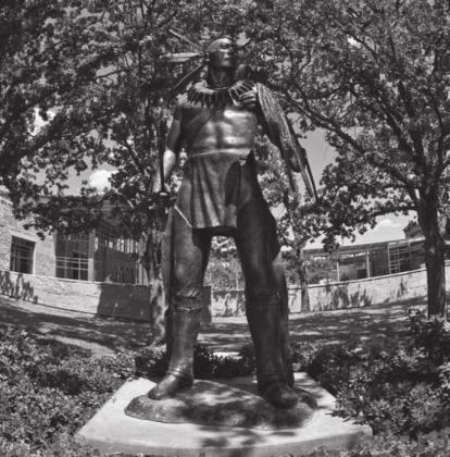 “The Warrior” brings patrons of the Chickasaw Cultural Center back to a time before European contact. The 9-foot bronze sculpture by artist Kelly Haney is within one of the most photographed areas at the cultural center. Courtesy photo