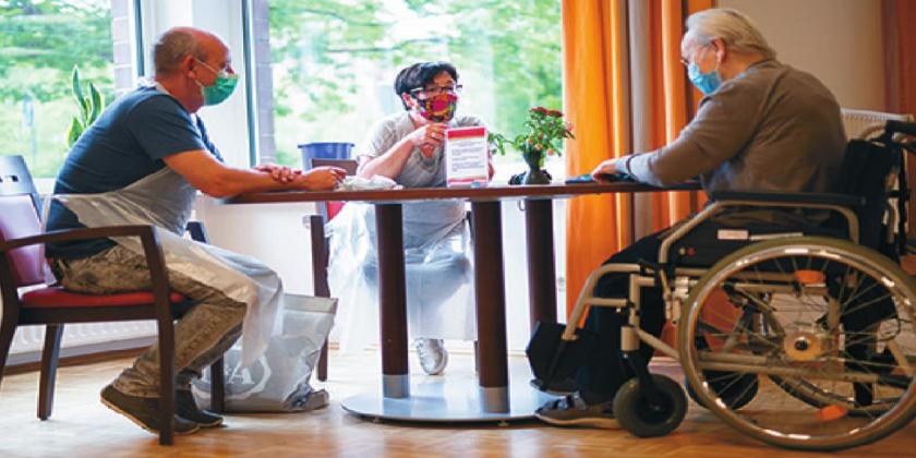 Vistitation and interaction is crucial for nursing home residents. It keeps their spirits up. Photo coures of dpa/picture alliance via Getty