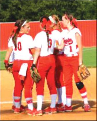 Courtesy Photo • Jamon Shipley - KHS Players from the Kingston fastpitch softball team meet at the mound in a game during the 2018 season. The squad is completing their preparations for the 2019 season, which begins later this week.