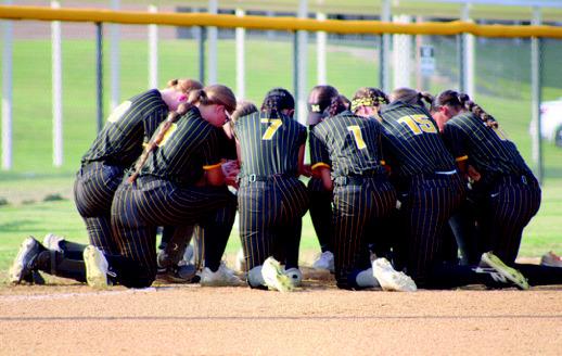 The Lady Wildcats prepare for the game. Summer Bryant