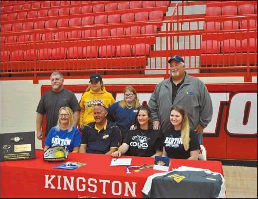 Shalene White • The Madill Record TOP LEFT: Kingston senior Amelia Mills (center) signs her letter of intent to play softball at Barton Community College in Great Bend, Kan. Nov. 18 in the KMAC.
