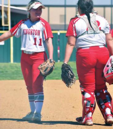 Emi O’Steen and Bri Harkins discuss strategy during a break at the State Championship game. T.J. Harkins