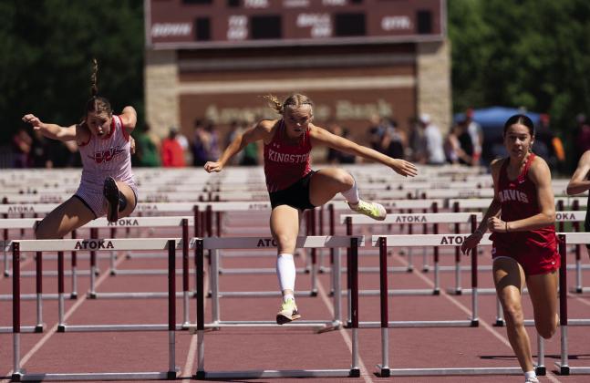 Kate Ratzlaff took the gold medal in the 300 meter hurdles with her personal best of 45.52 seconds. Photo courtesy of Kingston High School