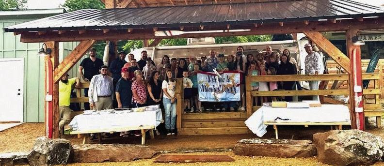 The Marshall County Chamber of Commerce held a Ribbon Cutting Ceremony for Texoma Shores Living on May 31. Despite the rainy weather, there was a good turn out. Courtesy photo