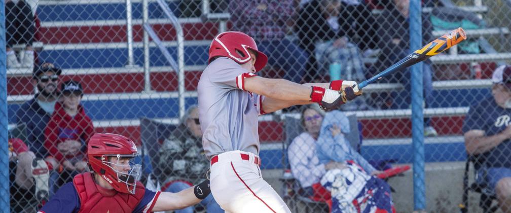 Ewan Weaver swings at a pitch. Matt Swearengin