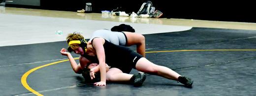 Madill cruises by Lone Grove in wrestling opener