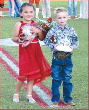 Matt Caban • The Madill Record Flower girl Myah Carlile and crown bearer Jarek Stovall pose for a photo during Kingston High School’s 2019 Homecoming ceremony Oct. 11.