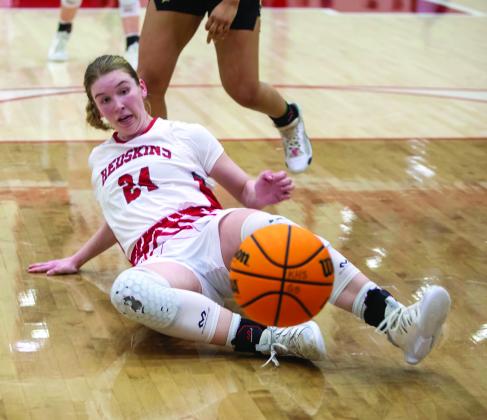 Joley Heydon goes for a loose ball during the game against Marietta. Photo by Matt Swearengin