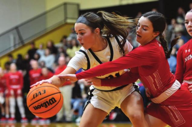 Lanie French fights for the ball during the Lady Redskins v Lady Wildcats game. Kingston won the game 69 to 50. Crockett Uber