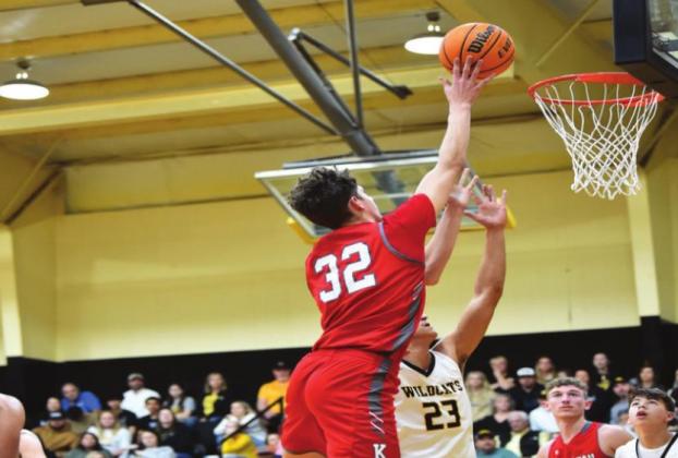 Reid Cason leaps for the basket during the Kingston v Madill game on February 15. The Redskins won 44 to 40. Crockett Uber