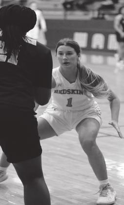 Raegan Davis looks determined to shut down her opponent during the Kingston vs Broken Bow game. Kambry Bohanan runs the ball down the court during the Kingston vs Broken Bow game.Crockett Uber