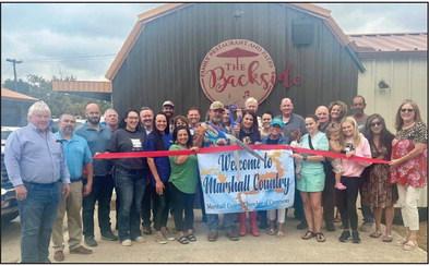 Courtesy photo The Marshall County Chamber of Commerce held a ribbon cutting for The Backside on September 15.