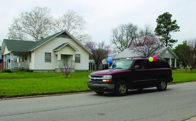 Madill Public Schools held a teacher parade on March 27. The parade of teachers in their vehicles started at the Wildcat Den and went through ten locations across town before returning to the Wildcat Den.