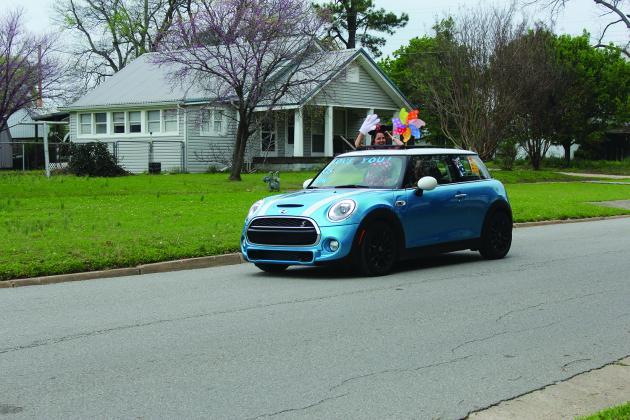 Madill Public Schools held a teacher parade on March 27. The parade of teachers in their vehicles started at the Wildcat Den and went through ten locations across town before returning to the Wildcat Den.