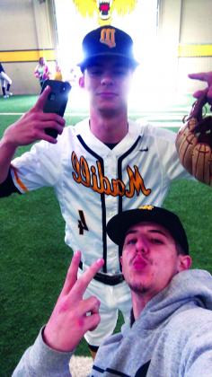 Wylbe Roberts and Case Coble of the Madill Wildcats baseball team take a selfie during the school's annual spring sports media day. Courtesy Photo.