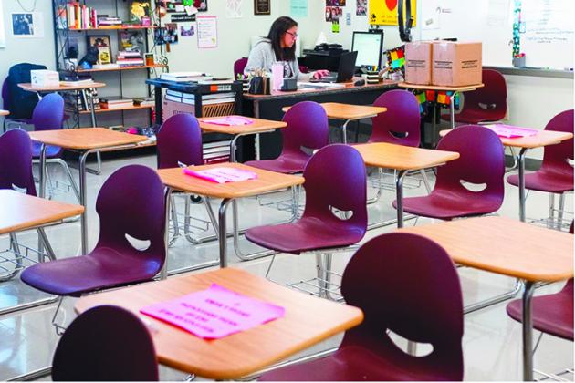 As Edmond Memorial High School's Elanna Dobbs and other teachers cope with the challenges of teaching in a pandemic, public school districts across Oklahoma are bracing for budget cuts for the 2021-22 school year. (Whitney Bryen/Oklahoma Watch)