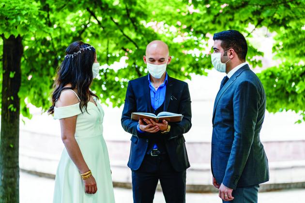 While planning a socially distant wedding presents some unique challenges, couples can take certain steps to ensure their big day is memorable and safe. (Courtesy photo)