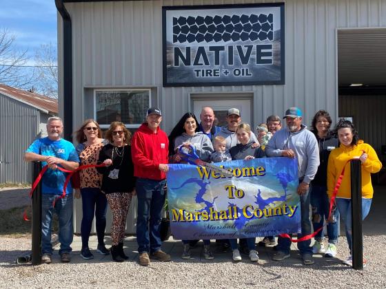 Andy Oldham, Kalynne Johnson, Debbie Allen, Doug Tyner, Yolanda Tyner, Buddy Tyner, Kelci Tyner, Brianna Tyner, Stealey Brown, Brissa Brown, Donny Railey, and Michael Herndon participated in a Ribbon Cutting for the new Native Tire and Lube. (Summer Bryant • The Madill Record)