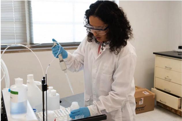 Maria Rendon, an environmental chemical laboratory scientist, prepares a water from an Oklahoma school to be tested for lead at the Department of Environmental Quality in Oklahoma City on Thursday. Federal regulations do not require drinking water to be tested at schools or day care centers but the state agency is encouraging all statewide facilities to have its water tested through a free program. (Whitney Bryen/Oklahoma Watch)