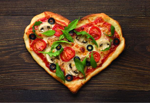 Save on Valentine’s Day festivities with a homemade meal, like a heart-shaped pizza at home. (Courtesy photo)
