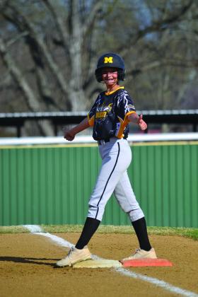 Lauren Campbell gives two thumbs up to show her love of the game. Summer Bryant • The Madill Record