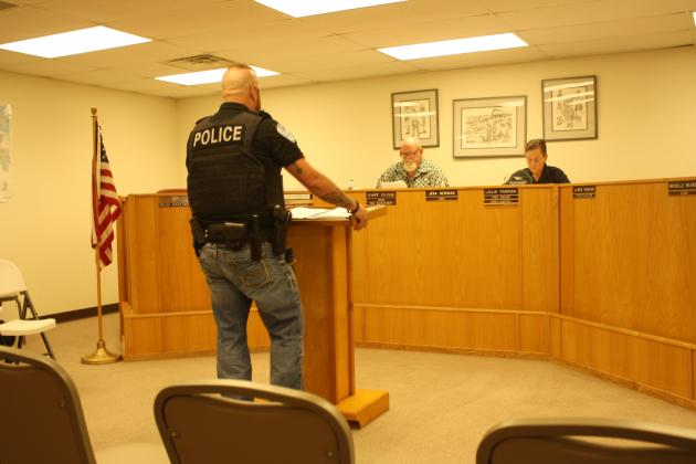 Newly elected police chief Kasey Cox discussing a new animal control truck to be purchased. Photo from Gary Jackson.