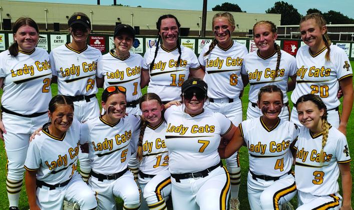 The Madill Lady Wildcats softball team pose after the game against Pauls Valley on August 9. Bottom row (l-r): Brooklyn Washington, Andie Wallace, Zeplyn Thomas, Maryn Mancini, Lauren Campbell, Kimber Gentis Top row (l-r): Maddie Ritchie, Kaylee Moore, Kaia Henry, Laila Pickens, Ireland Groeber, Dahlia Marris, Peyton Arnold. Courtesy photo