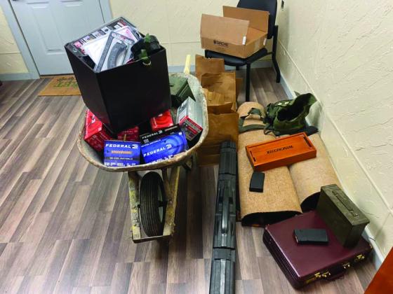 Deputies seized 17 firearms and over 7,000 rounds of ammo. One firearm was reported stolen from Kansas. (Courtesy photo)