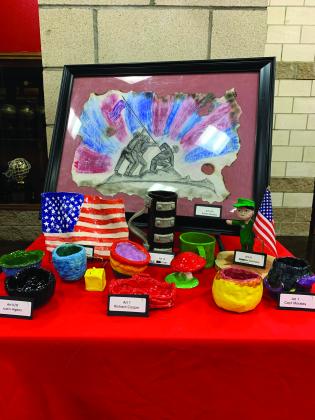 Kingston art students display art work  or Veterans Day. (Leslie Mowles)