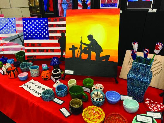 Kingston art students display art work  or Veterans Day. (Leslie Mowles)