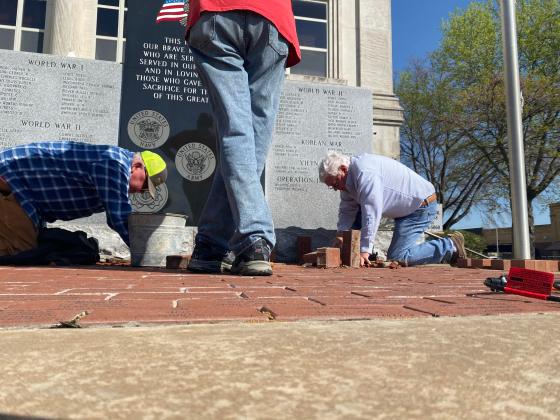 The American Legion added 15 new bricks to the Veteran's Walk on March 31. (Summer Bryant)