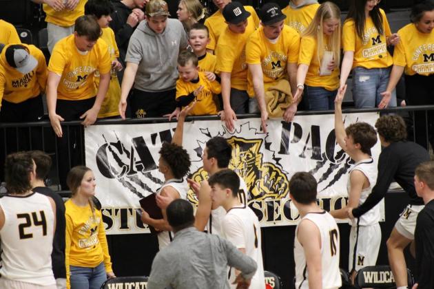 Wildcat fans congratulate the players on a job well done. They are one step closer to being the state champs.