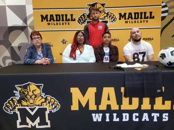 Photo (seated, l-r): Tammie King, Jaclyn King, Sadie Stumblingbear, Tyler King (standing): Murray State soccer coach John Connor