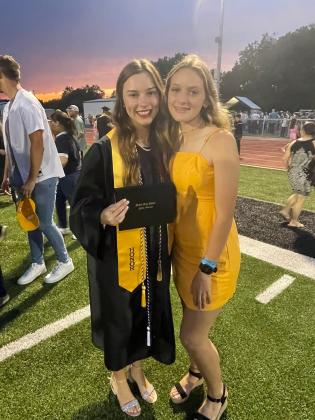 Jayden Weiberg, left, at her graduation with Korlee Cunningham-Martin, right. (Courtesy photo)