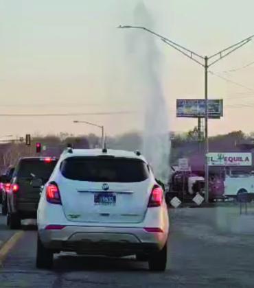 A water main break in Madill shot water up approximately 15 feet in the air. (Photo by Shalene White)