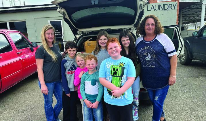 Jaxson, front right, along with Piper, Bodie, Cassie, Marshall and Bonnie collected items for people in need. (Gwen Wilson)