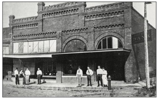 The west side of Main Street that J.E. Flynt built for the First State Bank and a mercantile store. These buildings were located where the Kingston Pharmacy, Family Health Center and Kingston Hardware store now stand. (Courtesy photo)